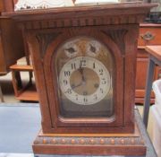 An Edwardian mantle clock, with a chime silent dial,