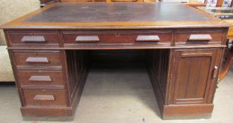 An Edwardian oak pedestal desk,