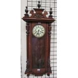 A walnut cased Vienna regulator type wall clock