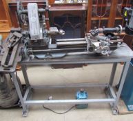 A Myford Lathe (Sold as seen - untested) - Please note that the drill table and vice in the left of