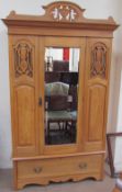 An Edwardian satin walnut wardrobe,