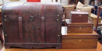 A modern domed trunk together with a mahogany laptop desk and two boxes