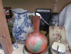 A copper lustre jug together with brasswares, part tea sets, pottery jugs, mantle clock, gong,