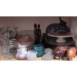 African carvings together with blue and white plates, glass dishes, glass vases,