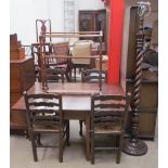 A 19th century oak gate leg dining table of rectangular form with drop flaps on square legs