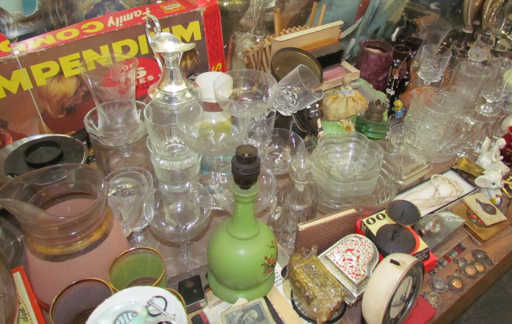 A family compendium together with drinking glasses, mantle clocks,