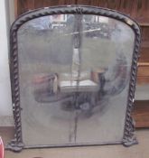 A Victorian ebonised overmantle mirror,