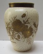 A Wedgwood vase decorated with flowerhead and leaves to a cream ground, No.