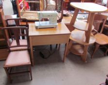 A pair of bedroom chairs together with a Capri electric sewing machine and table,