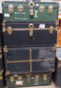 Four brass bound travelling trunks
