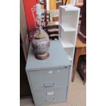 A three drawer filing cabinet together with two melamine bookcases,