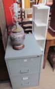 A three drawer filing cabinet together with two melamine bookcases,