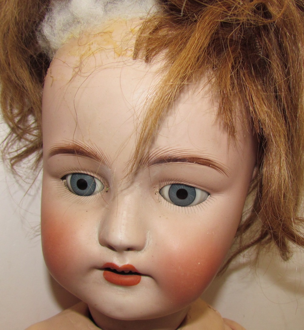 A Simon & Halbig 1078, bisque head doll, with closing blue eyes, open mouth and teeth, - Bild 2 aus 2