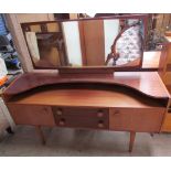 A Castle teak dressing table together with a matching wardrobe