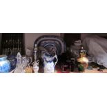 Assorted drinking glasses together with a part dinner set, blue and white plates,