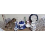 A large lot including drinking glasses, electroplated goblets and Italian pottery candlesticks,