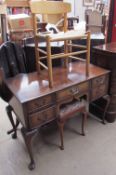 A 20th century walnut dressing table together with a dressing table stool and a Mobler ash dining