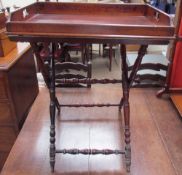 A 19th century mahogany butler's tray on stand,