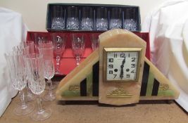 An Art Deco style mantle clock together with boxed and loose crystal drinking glasses