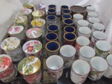 Japanese floral decorated porcelain beakers together with Japanese cups and covers and a collection