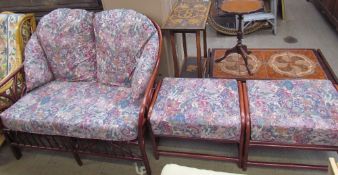 A three piece conservatory suite together with a pair of conservatory chairs