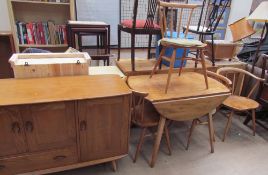 An Ercol light oak sideboard,