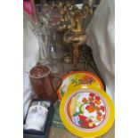 Glass decanters together with Wedgwood Clarice Cliff style plates, brass vases, brass tongs,