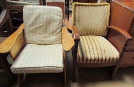 An oak framed upholstered elbow chair together with another elbow chair