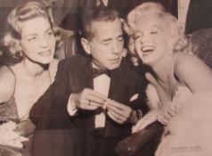 A print of Marilyn Monroe together with four other decorative prints