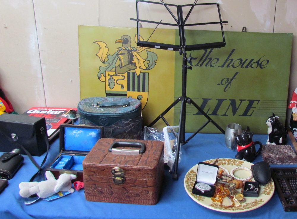 A sign for "The House of Line" together with a music stand, pottery charger, jewellery boxes,