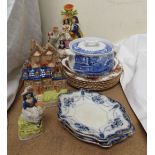 Staffordshire type figures together with a blue and white meat tureen and cover,