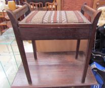 A mahogany piano stool on square tapering legs