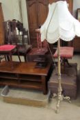 A 19th century oak bookcase with a moulded cornice above four shelves on a plinth base