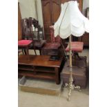 A 19th century oak bookcase with a moulded cornice above four shelves on a plinth base