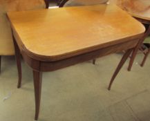 A 19th century mahogany tea table with a D shaped top on square tapering legs