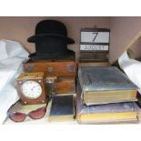 Two bowler hats together with an oak cigar box, a walnut cased clock, Date board,