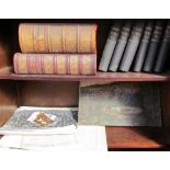 Six volumes of Henry's Bible together with two leather bound bibles, black and white photographs,