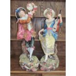 A large pair of continental pottery figures of musicians,