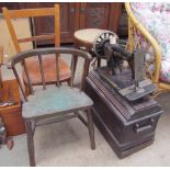 Two childs chairs together with a singer sewing machine and a stool