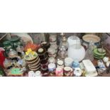Assorted steins together with painted canal wares, stoneware goblets, oil lamps,