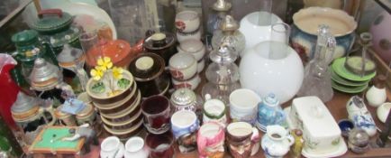 Assorted steins together with painted canal wares, stoneware goblets, oil lamps,