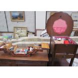 An oak sewing box of shaped circular form together with a concertina action sewing box