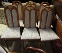 A set of six modern upholstered dining chairs