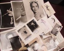 A collection of postcards and photographs,some signed, including ballet dancers, Gene Kelly,