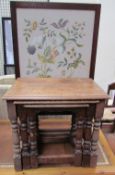 An oak nest of three tables together with a walnut chest of drawers and a fire screen