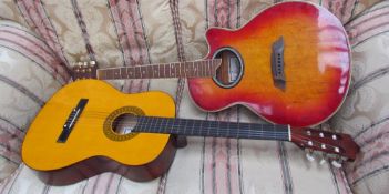 A Jim Deacon acoustic guitar together with a Herald acoustic guitar