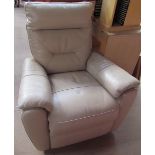 A cream leather electric armchair