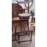 An Edwardian piano stool with a back and adjustable seat together with an oak occasional table with