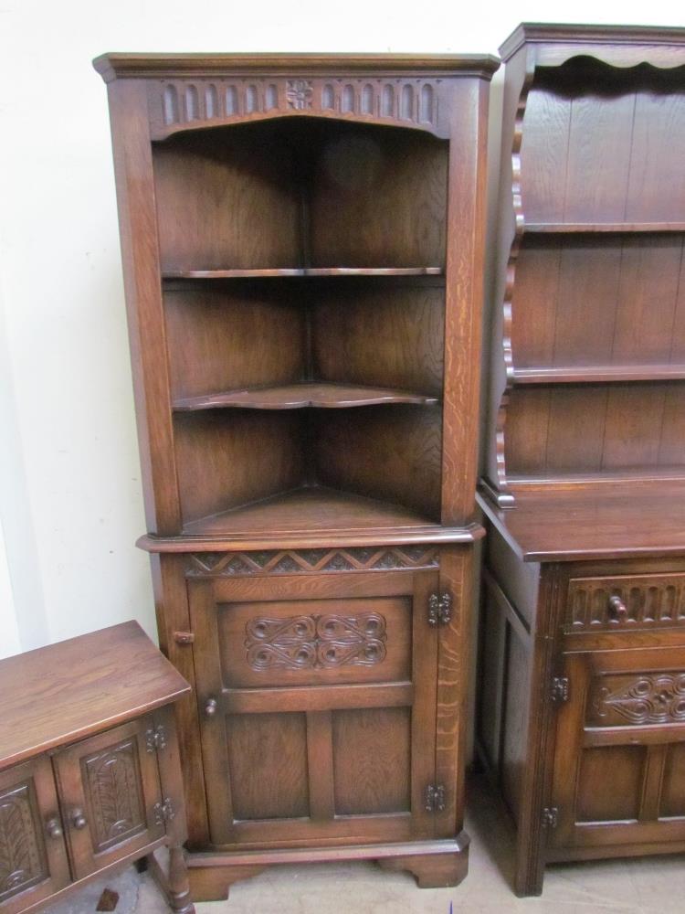 A Bevan Funnel oak dresser with a moulded cornice above two shelves and a planked back, - Image 3 of 4