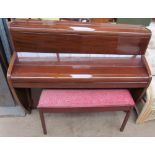A Challen mahogany upright piano,